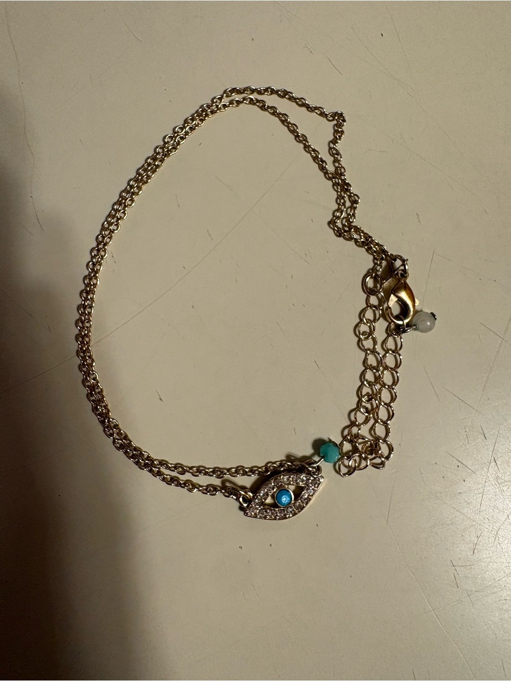 Avon Gold Layered Necklace with Turquoise and Blue Evil Eye Charm